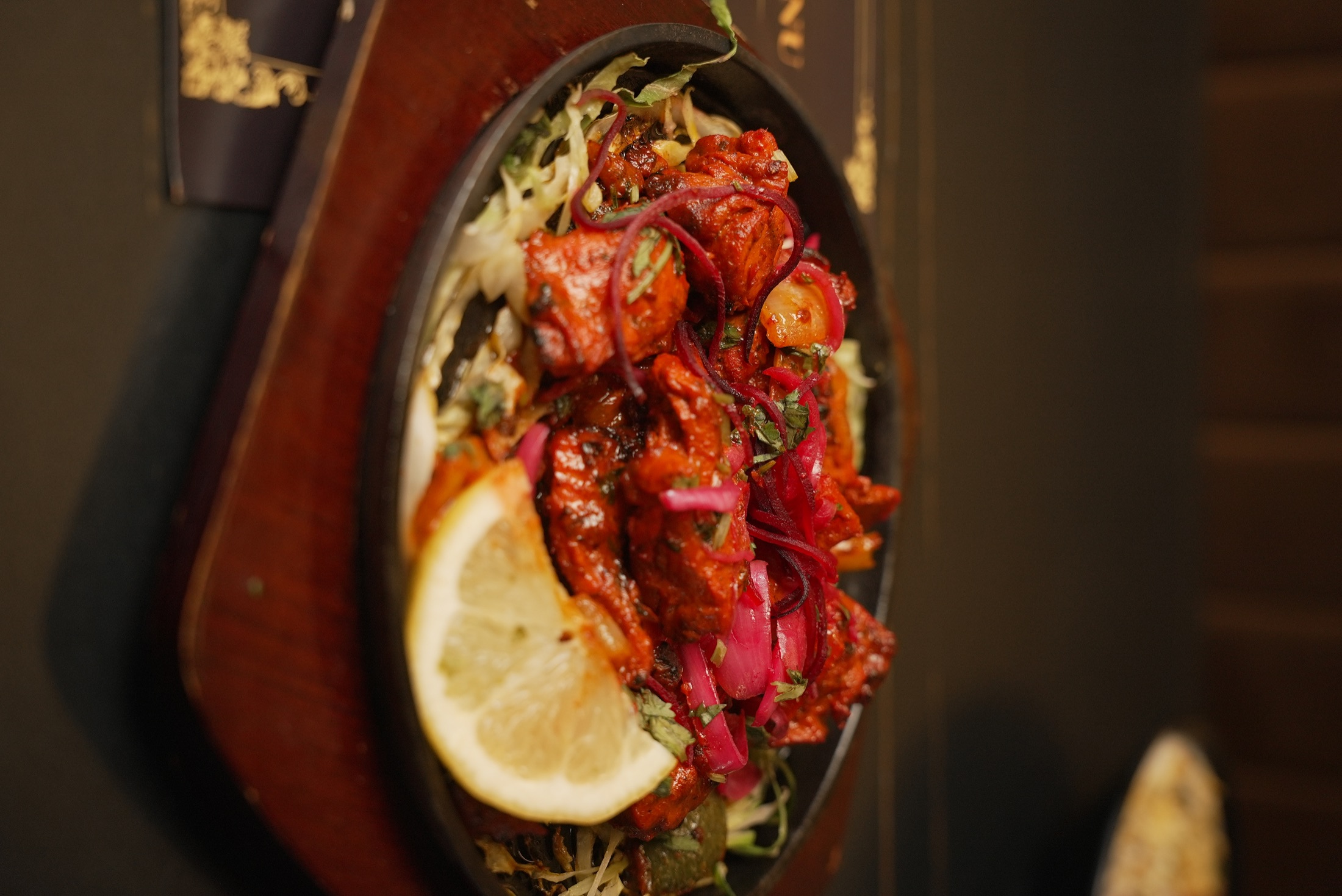 Cheffys Indian street food with pickled onions and lemon